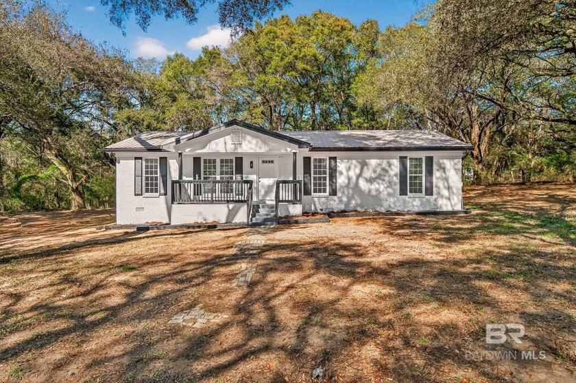 Rare opportunity to own a beautifully renovated 4 bedroom, 3 - Beach Home for sale in Grand Bay, Alabama on Beachhouse.com