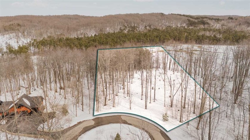 Set within the wooded landscape of True North Golf Club, this - Beach Lot for sale in Harbor Springs, Michigan on Beachhouse.com