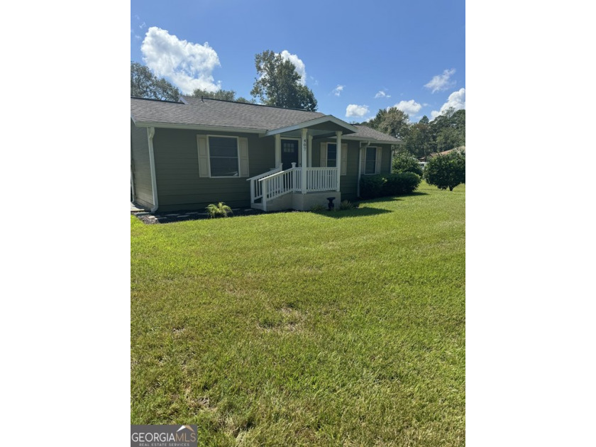 COZY, CHARMING, AND NEAT AS CAN BE, WITH SPECIAL FEATURES SUCH - Beach Home for sale in Saint Marys, Georgia on Beachhouse.com