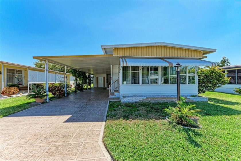 Located in the active and tidy 55+ community of Palm Lake - Beach Home for sale in Bradenton, Florida on Beachhouse.com