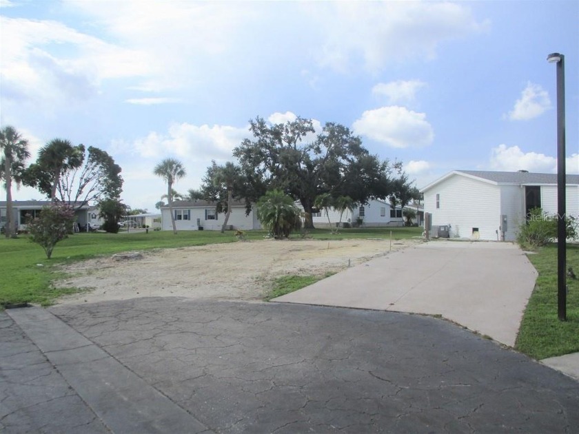 Winner of 2023 Best of Port Charlotte Mobile Home Parks!  This - Beach Lot for sale in Punta Gorda, Florida on Beachhouse.com