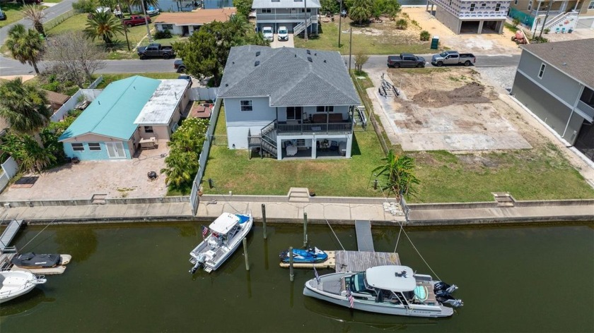 Discover coastal living at its finest in this elevated - Beach Home for sale in Hernando Beach, Florida on Beachhouse.com