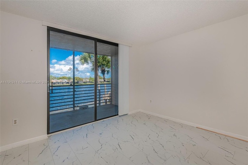 *Enjoy stunning lake views from the comfort of your own home in - Beach Condo for sale in Pembroke Pines, Florida on Beachhouse.com