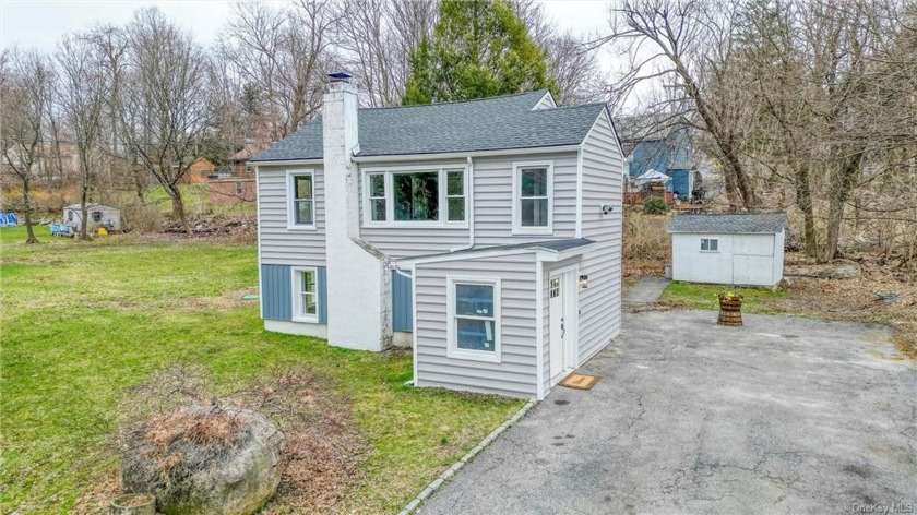 You must see this completely renovated home in Lake Carmel! With - Beach Home for sale in Kent, New York on Beachhouse.com