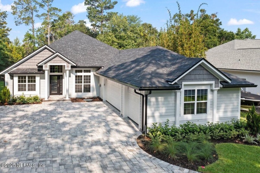 This exceptional 4-bedroom, 3-bath home showcases high-end - Beach Home for sale in Fleming Island, Florida on Beachhouse.com