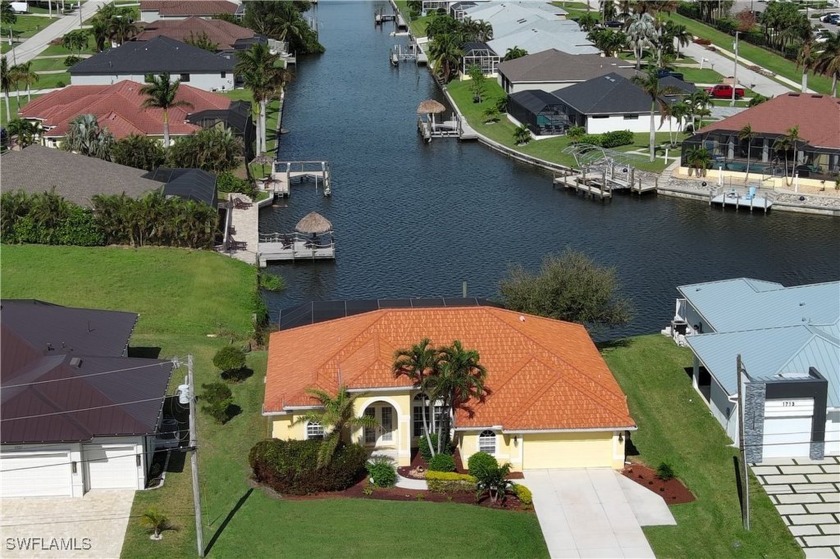 While your intersecting gulf-access canal view doesn't go on - Beach Home for sale in Cape Coral, Florida on Beachhouse.com