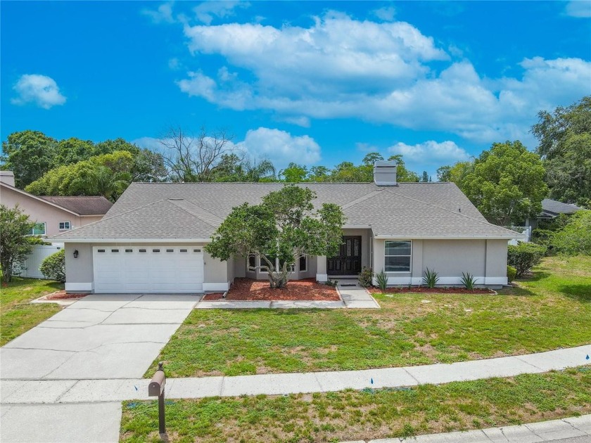 Beautifully maintained 3-bedroom, 2-bath pool home in the - Beach Home for sale in Oldsmar, Florida on Beachhouse.com