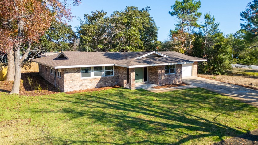 Stunning fully remodeled 4-bed, 2-bath gem in the highly sought - Beach Home for sale in Fort Walton Beach, Florida on Beachhouse.com