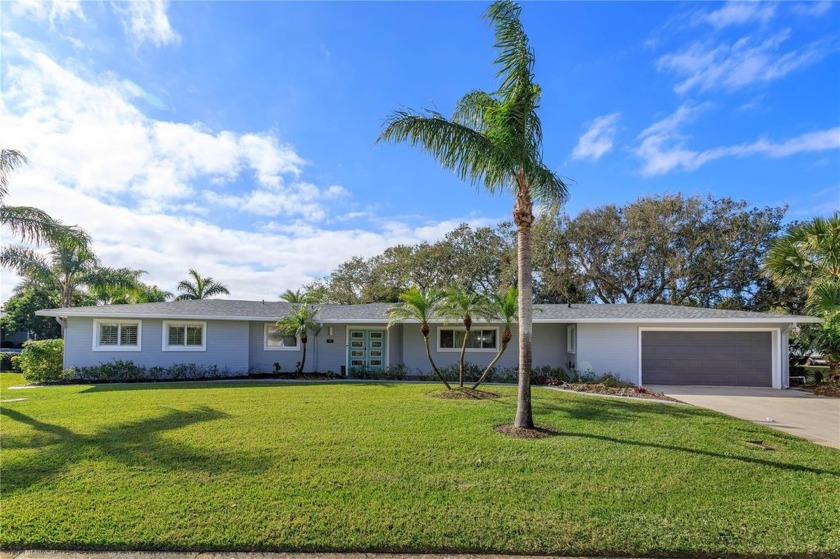 WATERFRONT HOME WITH SPARKLING POOL LOCATED IN NEW SMYRNA - Beach Home for sale in New Smyrna Beach, Florida on Beachhouse.com