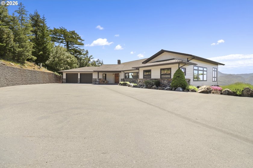 Experience the pinnacle of luxury living in this custom-built - Beach Home for sale in Gold Beach, Oregon on Beachhouse.com