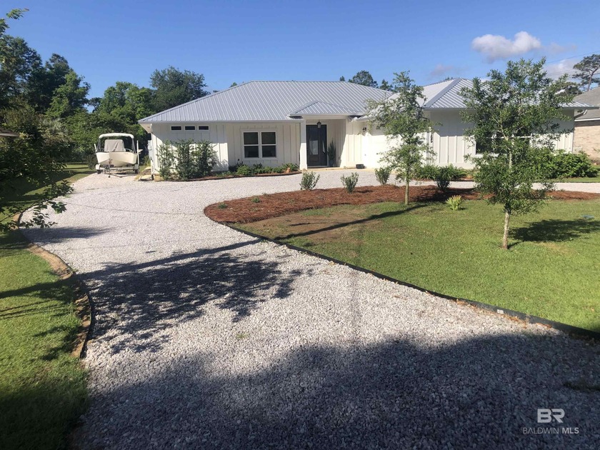 Welcome to this stunning 2021 custom-built coastal modern home - Beach Home for sale in Lillian, Alabama on Beachhouse.com