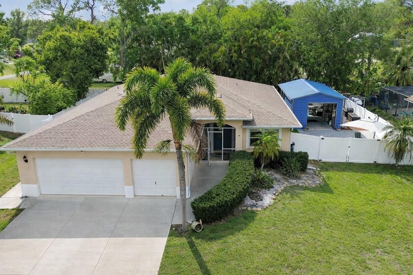 Tropical palm trees, space to spread out, and Florida living at - Beach Home for sale in Ellenton, Florida on Beachhouse.com