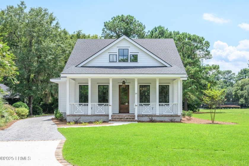 Nestled beneath a canopy of moss-draped live oaks, this charming - Beach Home for sale in Beaufort, South Carolina on Beachhouse.com