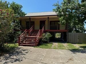 This  one of a kind waterfront home features beautiful views of - Beach Home for sale in Ocean Springs, Mississippi on Beachhouse.com