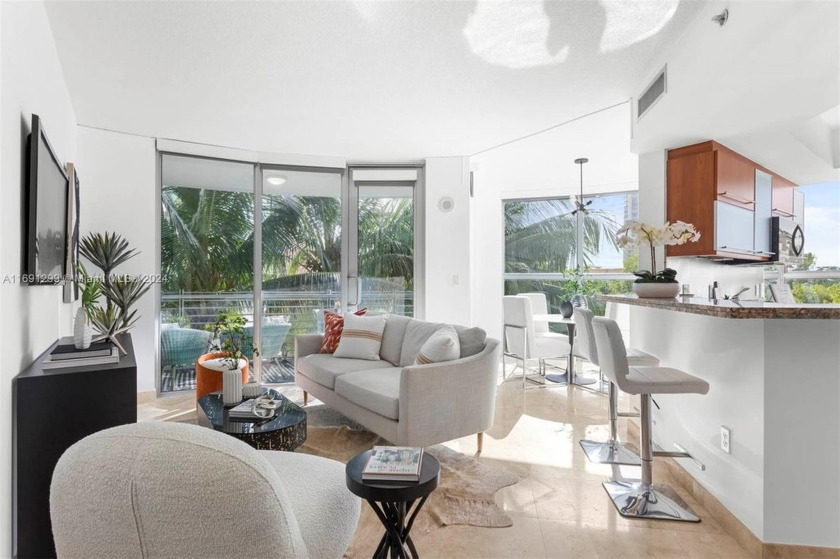 Presenting a meticulous 2-bedroom, 2-bathroom corner residence - Beach Condo for sale in Miami Beach, Florida on Beachhouse.com