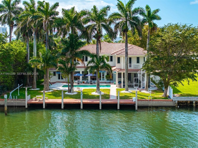 Two-story waterfront property in Hollywood Lakes featuring 100 - Beach Home for sale in Hollywood, Florida on Beachhouse.com