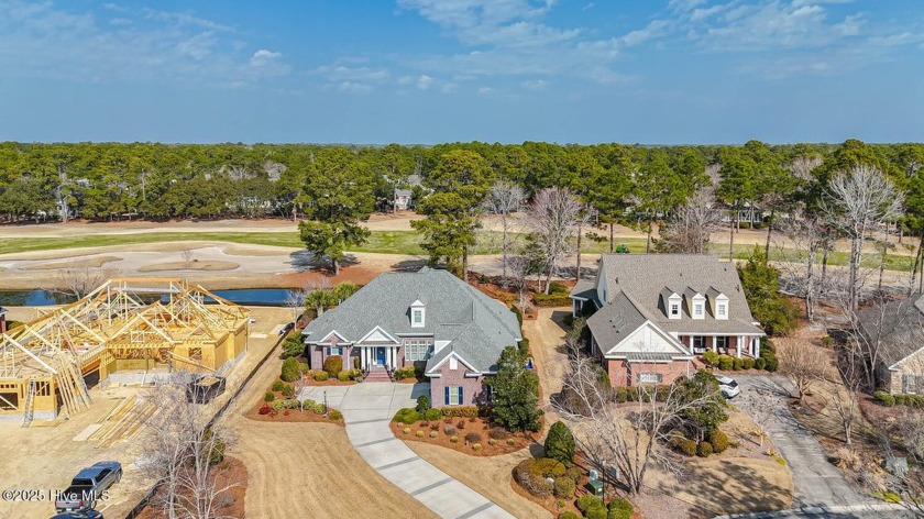 Gorgeous brick home on .54/acre with pond & golf views which is - Beach Home for sale in Ocean Isle Beach, North Carolina on Beachhouse.com