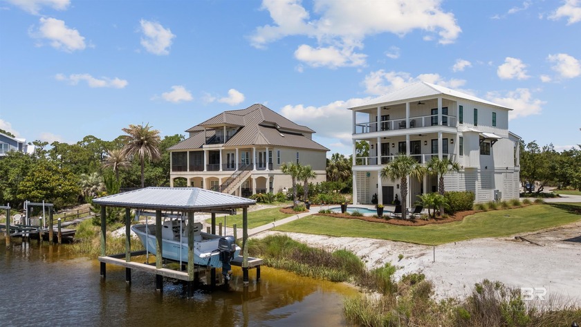 Experience refined coastal living in this exquisite custom-built - Beach Home for sale in Orange Beach, Alabama on Beachhouse.com