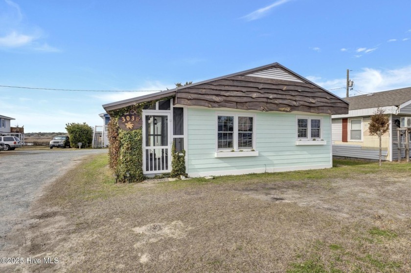 This home perfectly embodies the beach bungalow lifestyle! This - Beach Home for sale in Surf City, North Carolina on Beachhouse.com