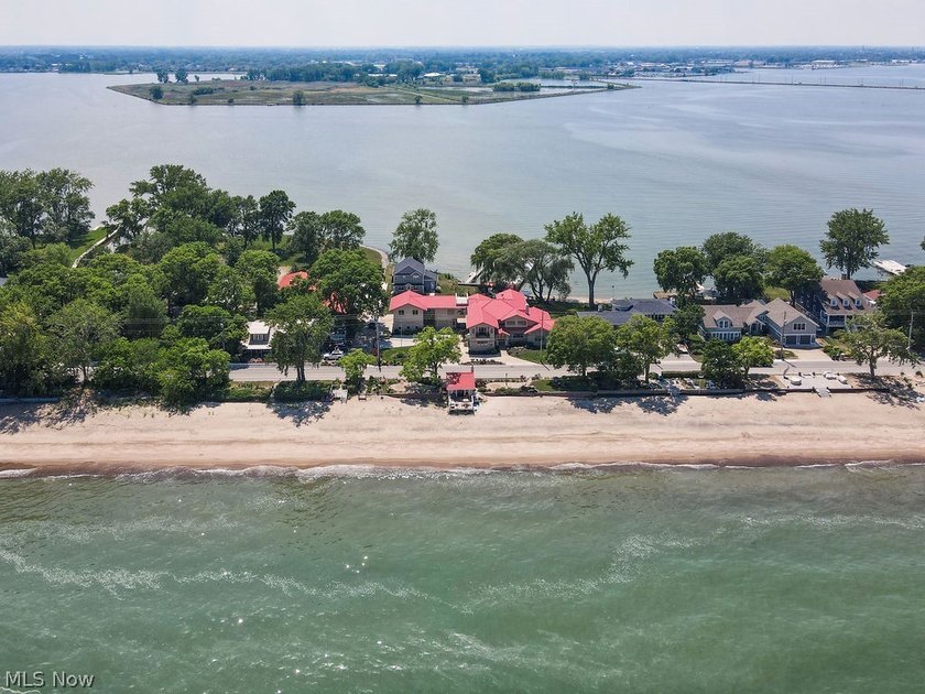 Welcome to 1431 Cedar Point Road, a rare lake-to-bayfront luxury - Beach Home for sale in Sandusky, Ohio on Beachhouse.com