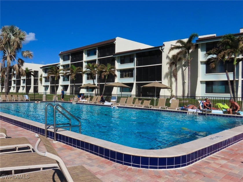 With its outstanding walk-right-out-to-the-beach location this - Beach Condo for sale in Sanibel, Florida on Beachhouse.com