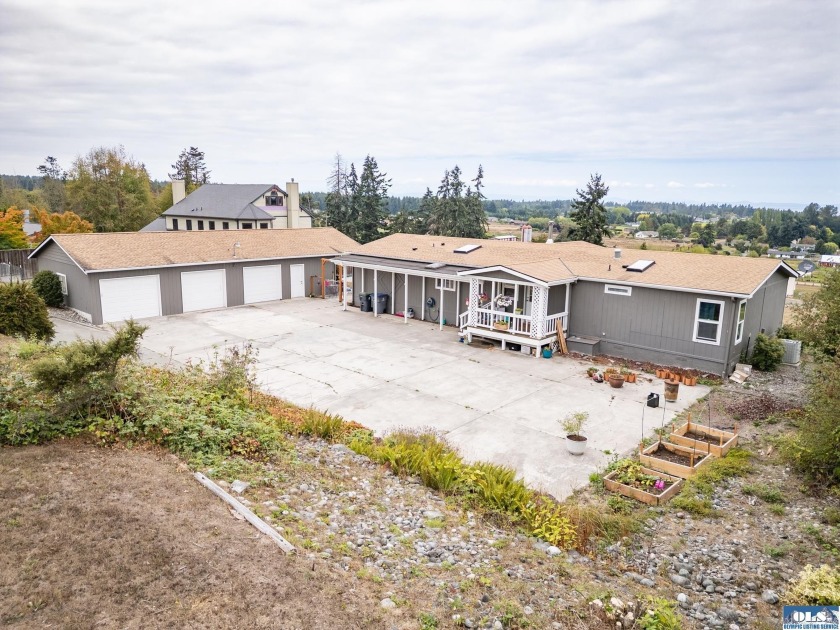 Enjoy sweeping views of the Strait and Victoria from this - Beach Home for sale in Port Angeles, Washington on Beachhouse.com