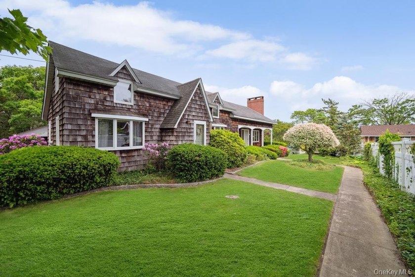 Located in the desirable Democratic Hill area, this 4-bedroom - Beach Home for sale in Patchogue, New York on Beachhouse.com