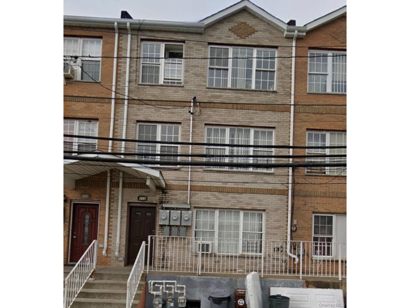 Come see this beautiful 3-family home by the beach! Located in - Beach Home for sale in Far Rockaway, New York on Beachhouse.com