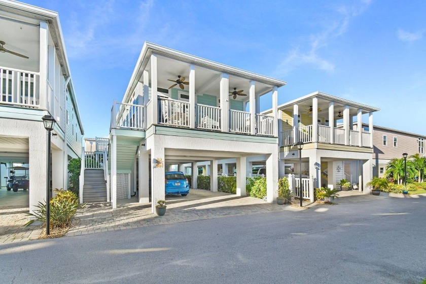 This stunning 2022 Key West Style home, located in the desirable - Beach Home for sale in Jensen Beach, Florida on Beachhouse.com