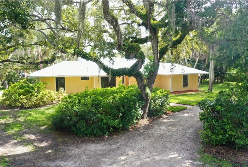 Enjoy complete privacy from this spacious 4 bedroom, 2 full bath - Beach Home for sale in Vero Beach, Florida on Beachhouse.com