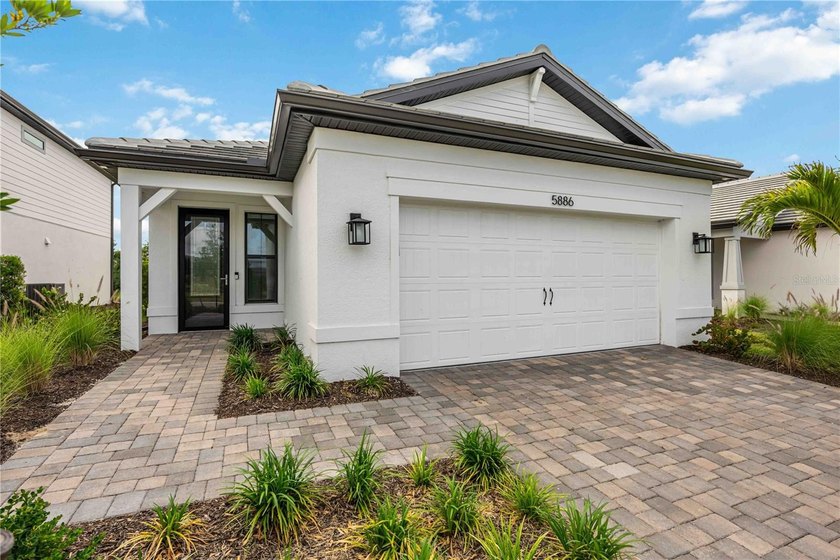 Welcome to the highly sought-after HALMARK model in the gated - Beach Home for sale in Nokomis, Florida on Beachhouse.com