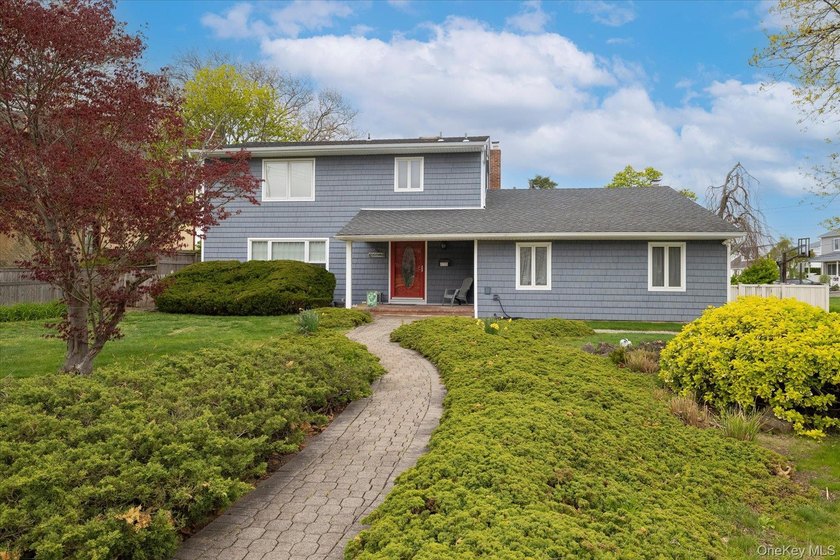 Welcome to this beautifully updated Side Hall Colonial in the - Beach Home for sale in Massapequa, New York on Beachhouse.com