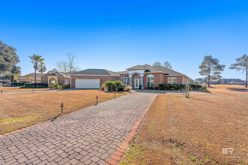 Heated pool with dual fountains. Golf course views with coastal - Beach Home for sale in Gulf Shores, Alabama on Beachhouse.com