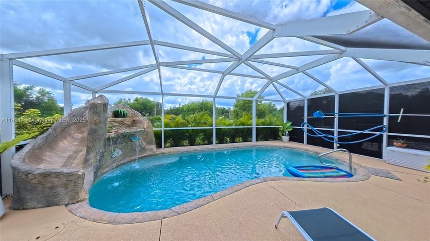 Welcome to this 3BR/2BA + den home in Lehigh Acres, built in - Beach Home for sale in Lehigh Acres, Florida on Beachhouse.com