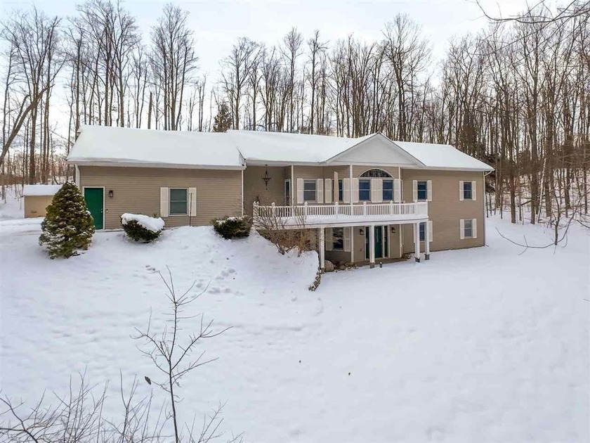 Nestled in a very private setting close to Petoskey, this - Beach Home for sale in Petoskey, Michigan on Beachhouse.com