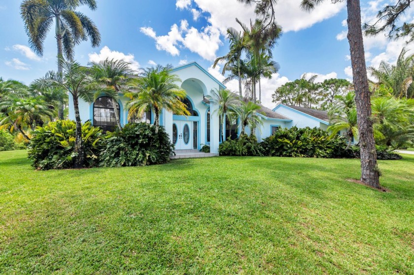 Welcome to your 5 acre picturesque, park like estate! This - Beach Home for sale in Palm Beach Gardens, Florida on Beachhouse.com