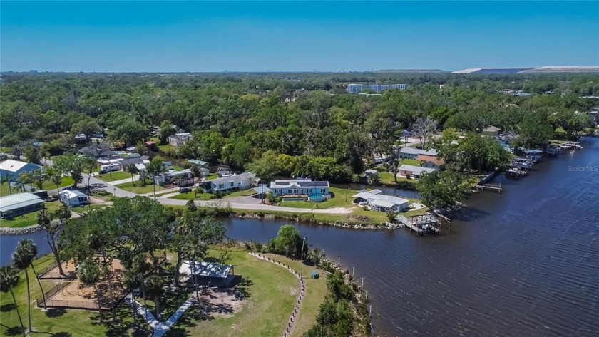 Wake up each day to peaceful river views in this charming home - Beach Home for sale in Riverview, Florida on Beachhouse.com