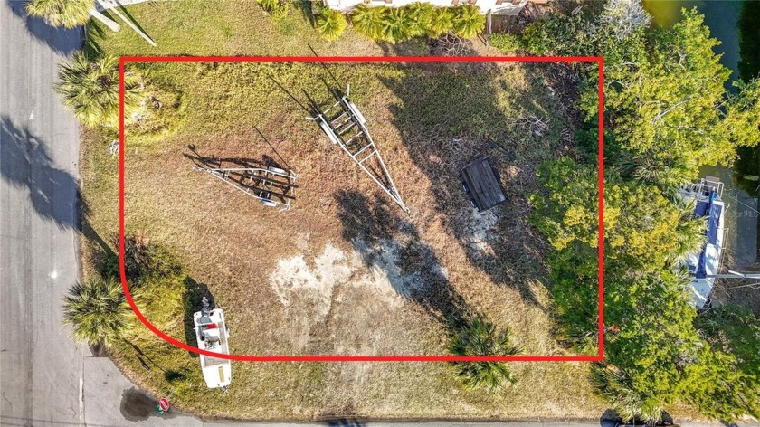 This prime waterfront lot offers an unparalleled opportunity to - Beach Lot for sale in Hernando Beach, Florida on Beachhouse.com