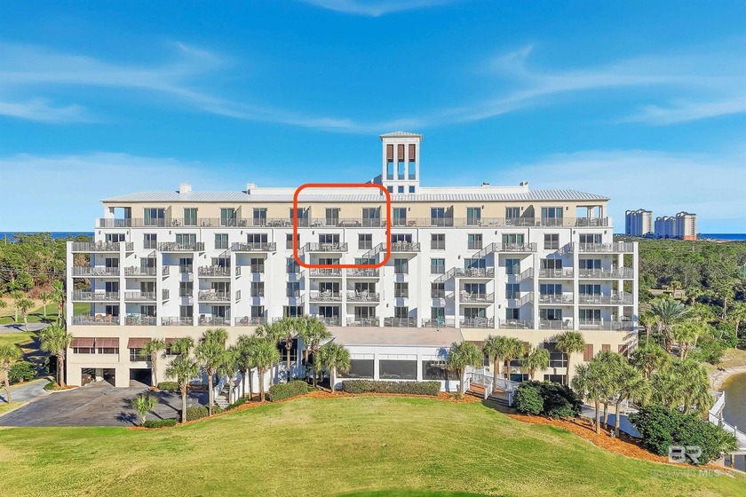 Experience elevated coastal living in this exceptional two-story - Beach Condo for sale in Gulf Shores, Alabama on Beachhouse.com