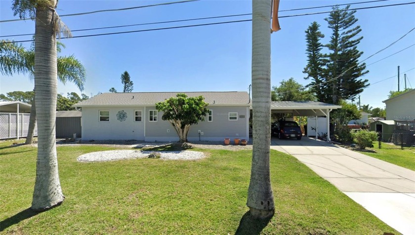 Discover this 2-bed, 2-bath fully furnished home on a deep water - Beach Home for sale in Port Charlotte, Florida on Beachhouse.com