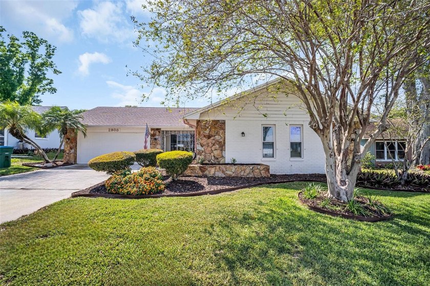 Beautifully updated 3-bedroom, 2-bath home offering nearly 2,000 - Beach Home for sale in Palm Harbor, Florida on Beachhouse.com