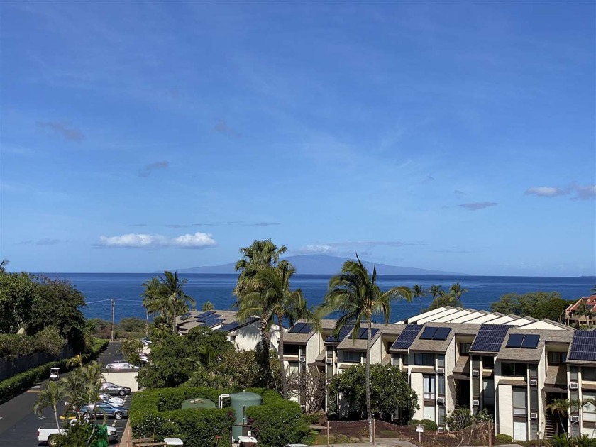 Golden sandy beaches and crystal blue waters just moments away - Beach Condo for sale in Kihei, Hawaii on Beachhouse.com