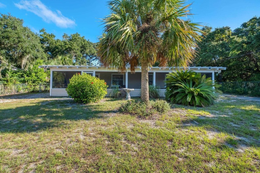 Discover the timeless charm of this classic 1960's beach house - Beach Home for sale in Alligator Point, Florida on Beachhouse.com