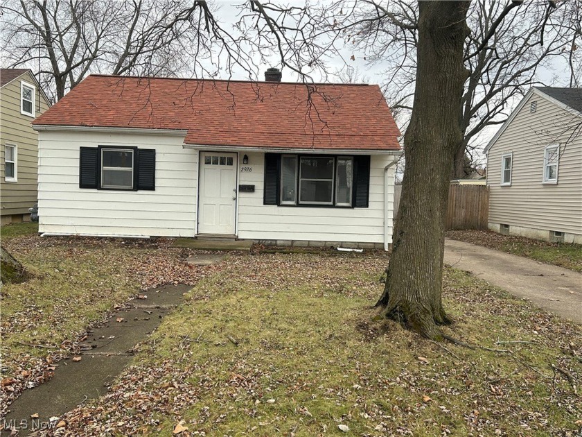 Welcome to this two bedroom one bath ranch styled house. Located - Beach Home for sale in Lorain, Ohio on Beachhouse.com