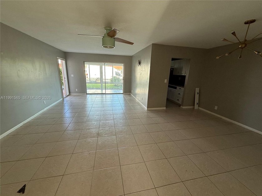 This well-maintained, single-story home offers tile flooring - Beach Home for sale in Delray Beach, Florida on Beachhouse.com