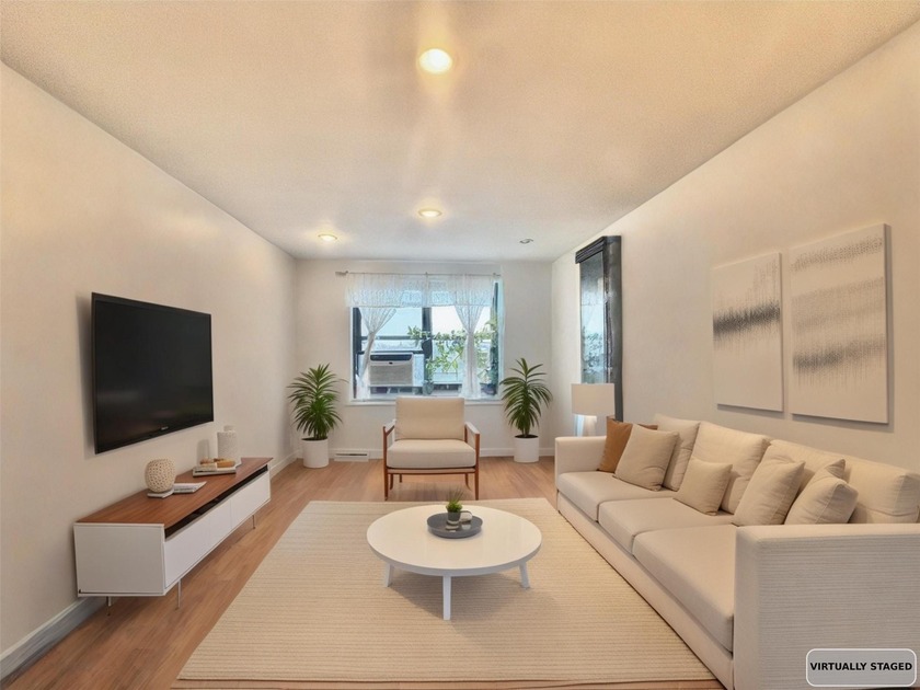 Spacious and sun-drenched, this top-floor two-bedroom - Beach Home for sale in Flushing, New York on Beachhouse.com
