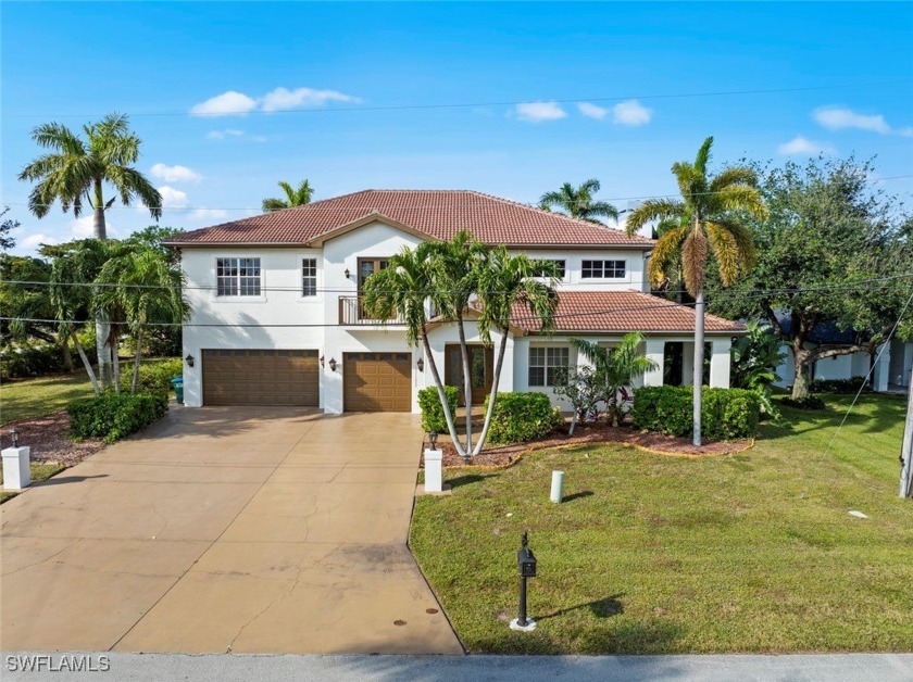 This stunning Mediterranean-style home is situated on a triple - Beach Home for sale in Cape Coral, Florida on Beachhouse.com