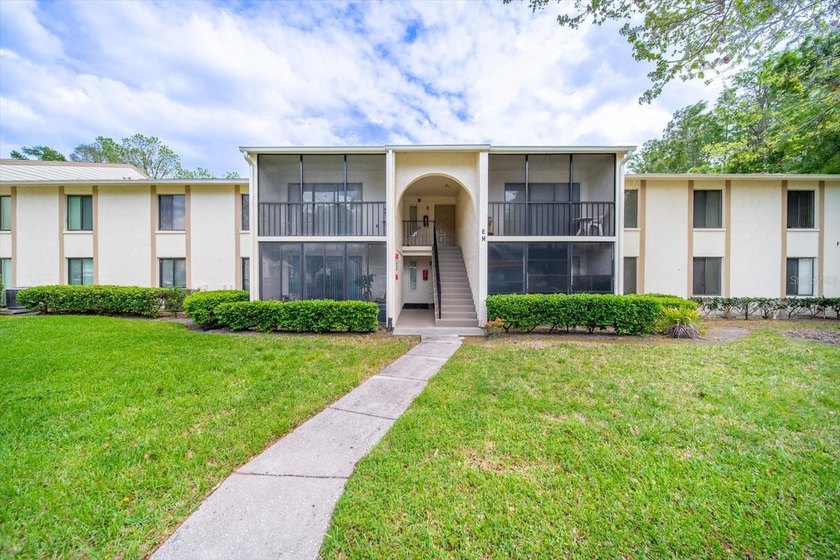 This turnkey second-floor condo in the Deer Hollow community in - Beach Condo for sale in Tarpon Springs, Florida on Beachhouse.com
