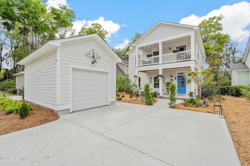 Situated on a prime lakefront lot in Camellia Banks, this - Beach Home for sale in Beaufort, South Carolina on Beachhouse.com