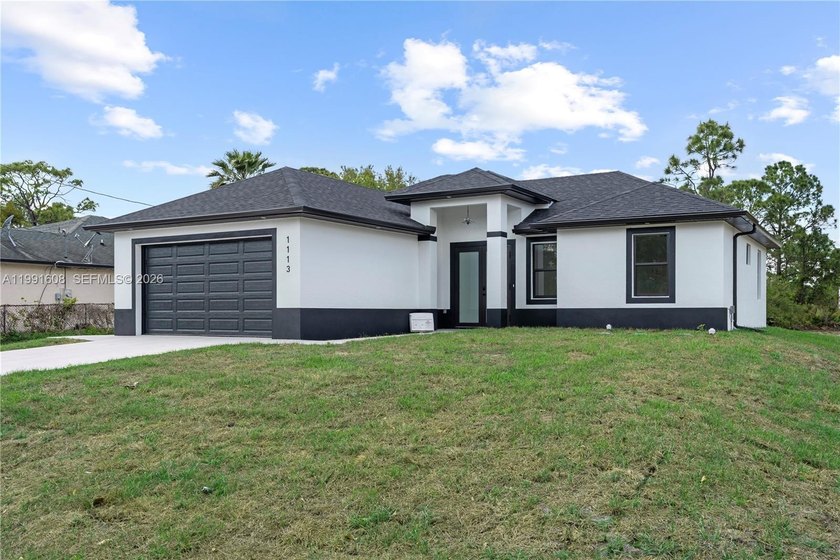 Welcome to this beautifully crafted new construction home at - Beach Home for sale in Lehigh Acres, Florida on Beachhouse.com